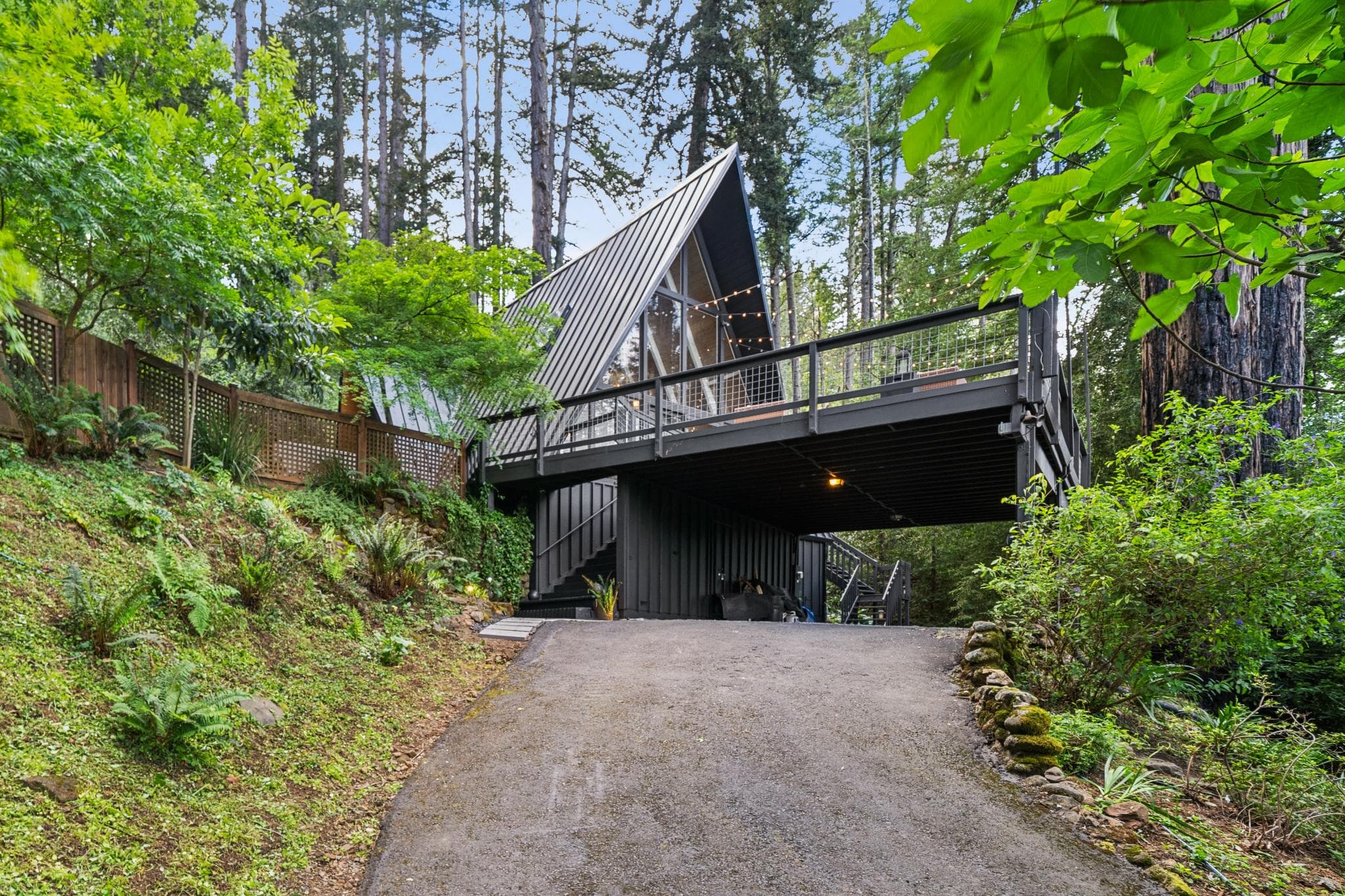 A-frame residence with soaring ceilings and floor-to-ceiling windows